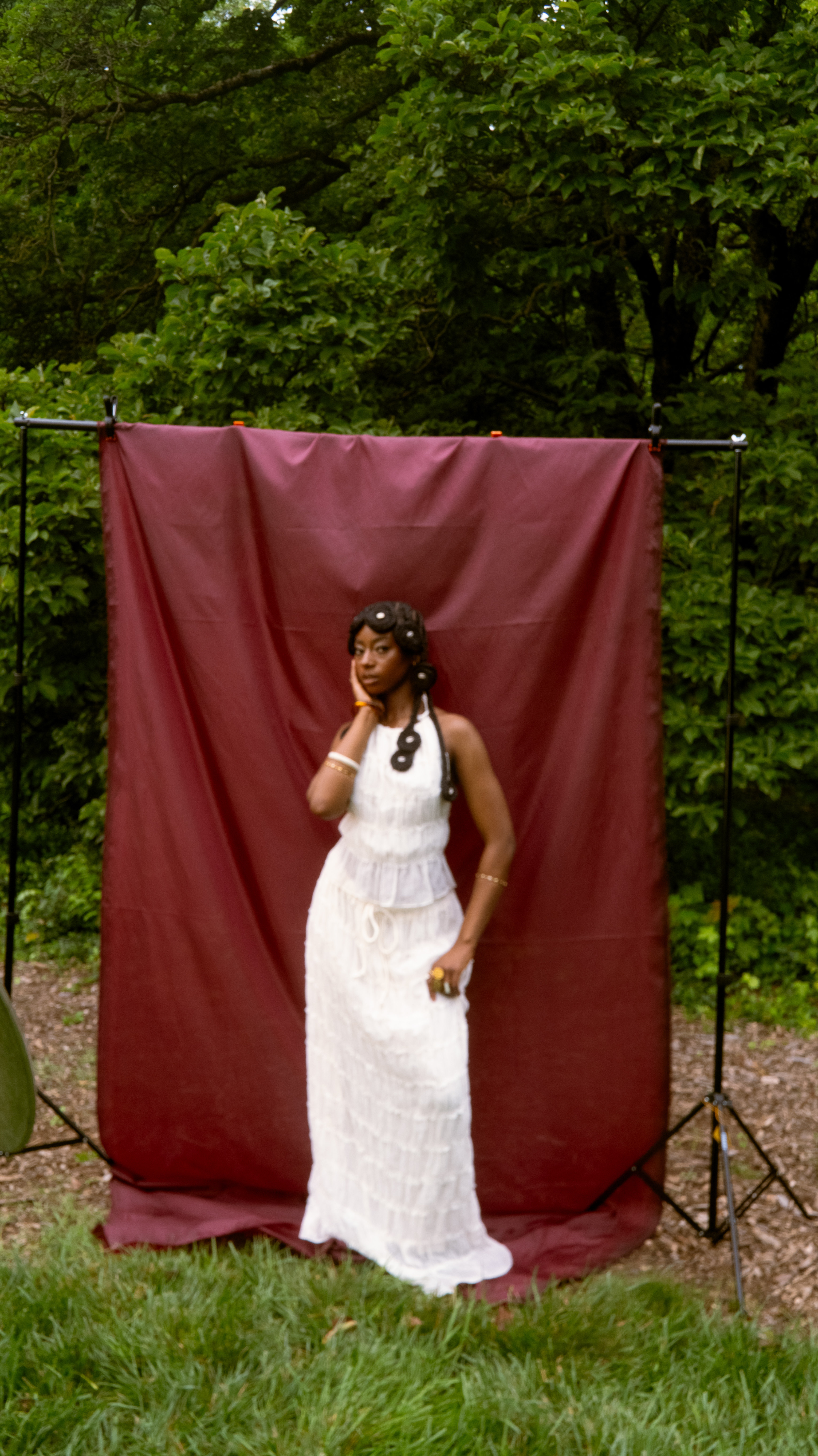 Full body portrait with fabric set outdoors