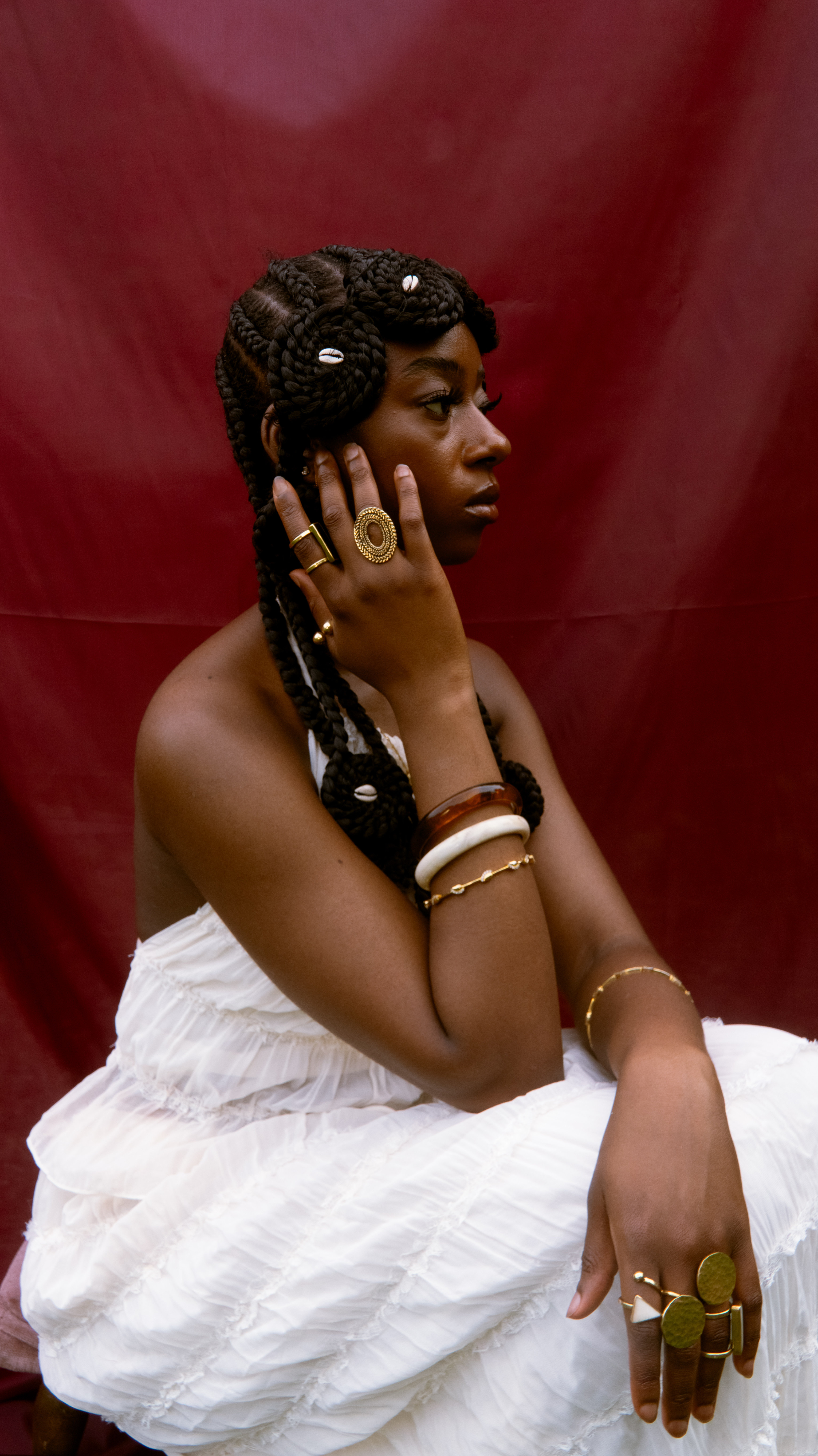 Seated portrait focused on hairstyle and styling